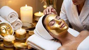 A close-up of skin shimmering with gold particles during a Gold Facial in Kottayam at Femin Space Beauty Parlour